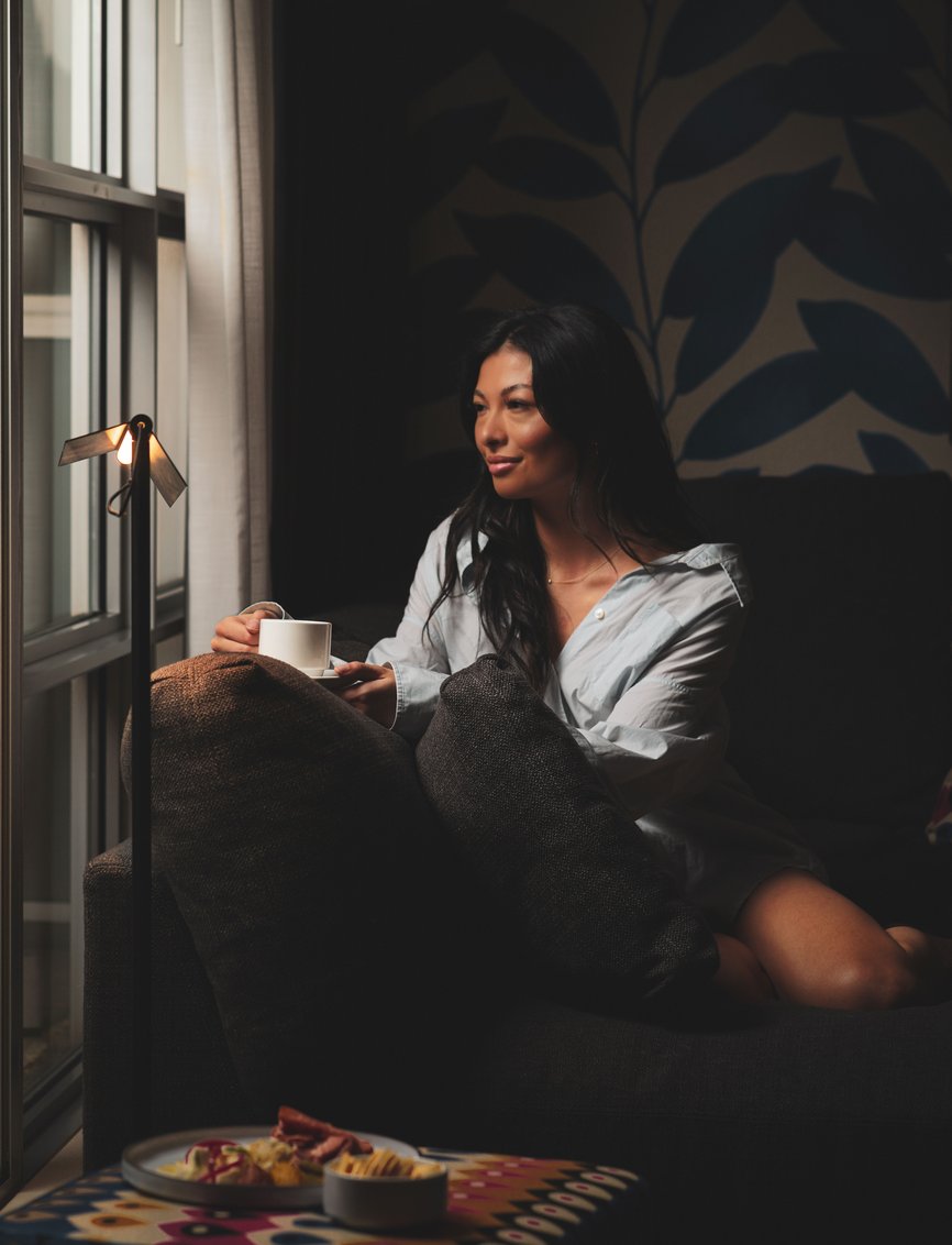 Guest Looking out the Window - Signature Suite